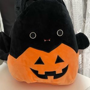 Emily in a pumpkin basket